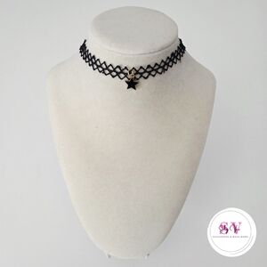 Black choker with mini star pendant